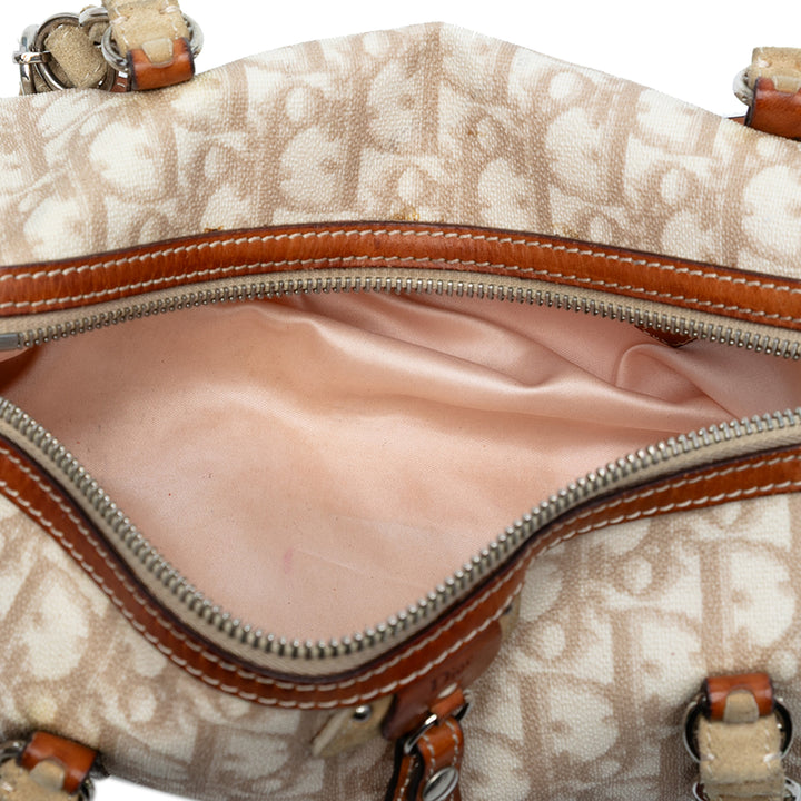 Dior Diorissimo Trotter Coated Toile Romantique Sac à main Marron – GABY PARIS Authentique
