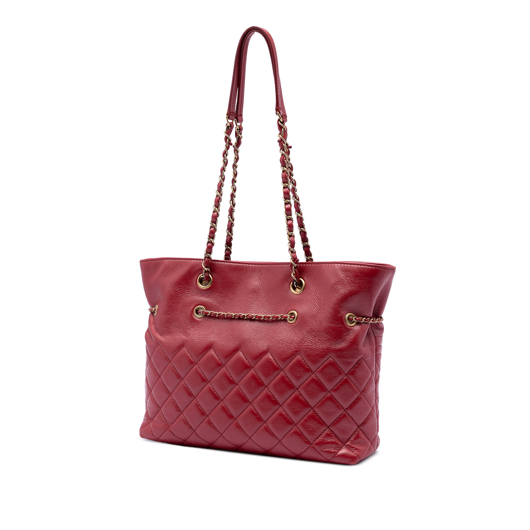 Chanel CC Matelassé Cuir de veau Front Zip Drawstring Cabas chaîne