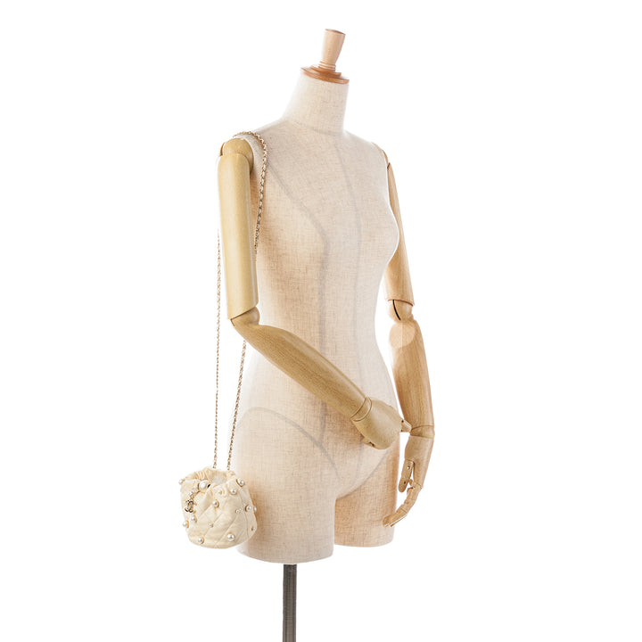 Mini Quilted Lambskin About Pearls Drawstring Bucket Bag White - Gaby Paris