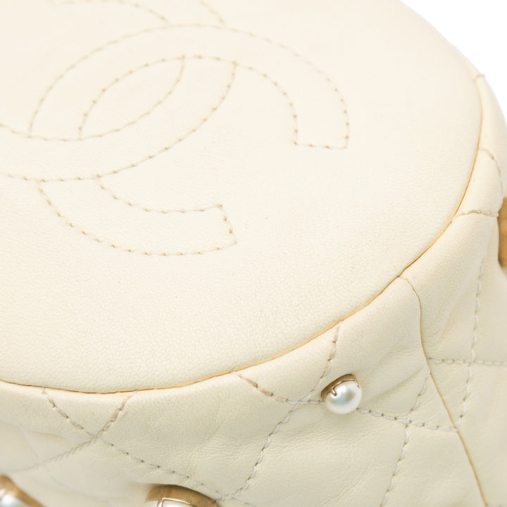 Mini Quilted Lambskin About Pearls Drawstring Bucket Bag White - Gaby Paris