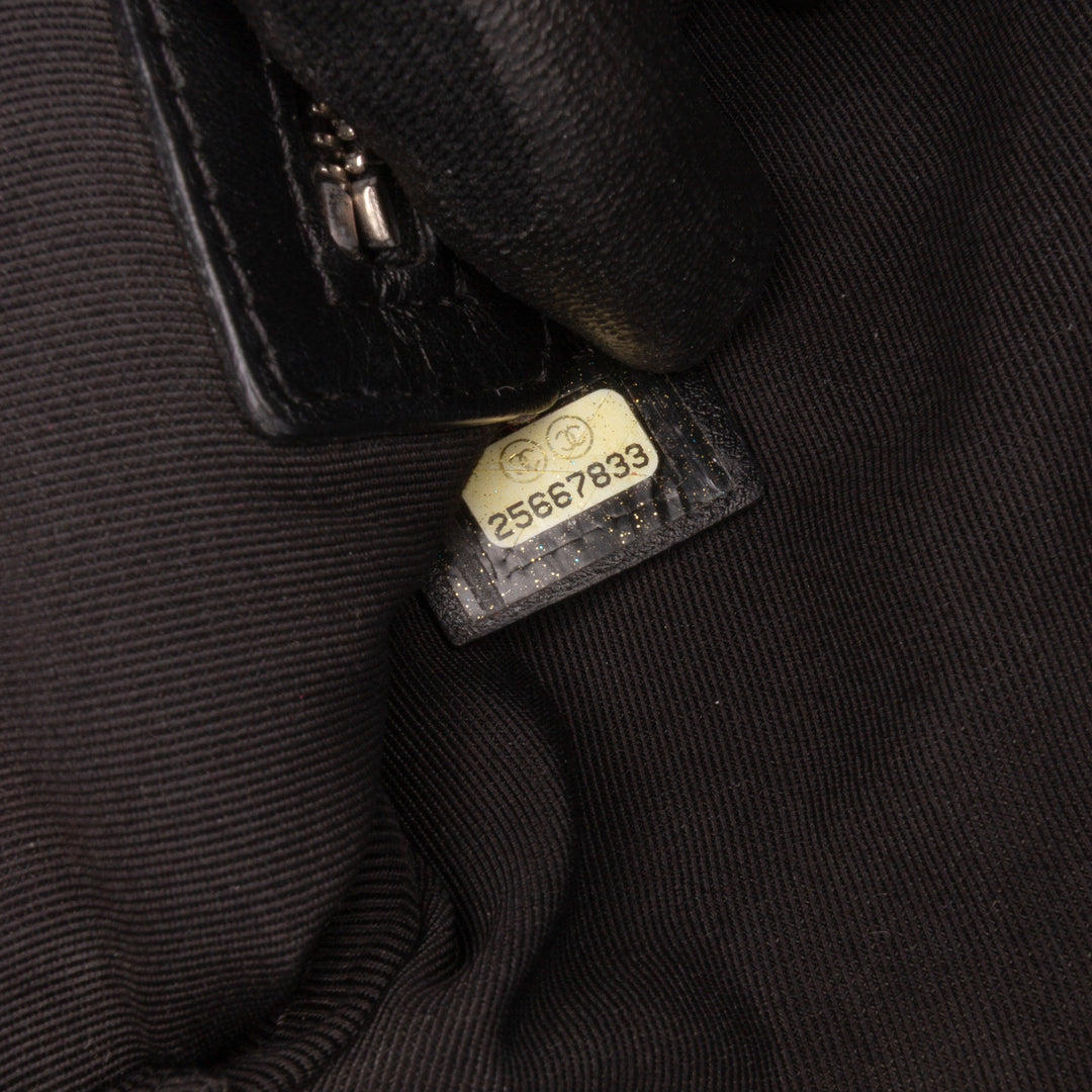 Coated Canvas Camellia Logo Wristlet Clutch Black - Gaby Paris