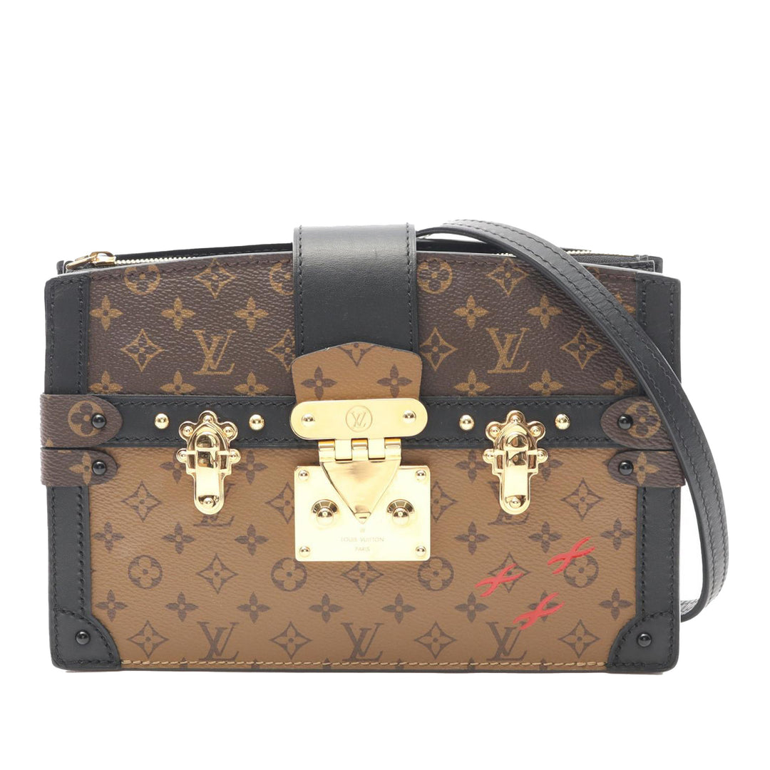 Monogram Reverse Trunk Clutch Brown - Gaby Paris
