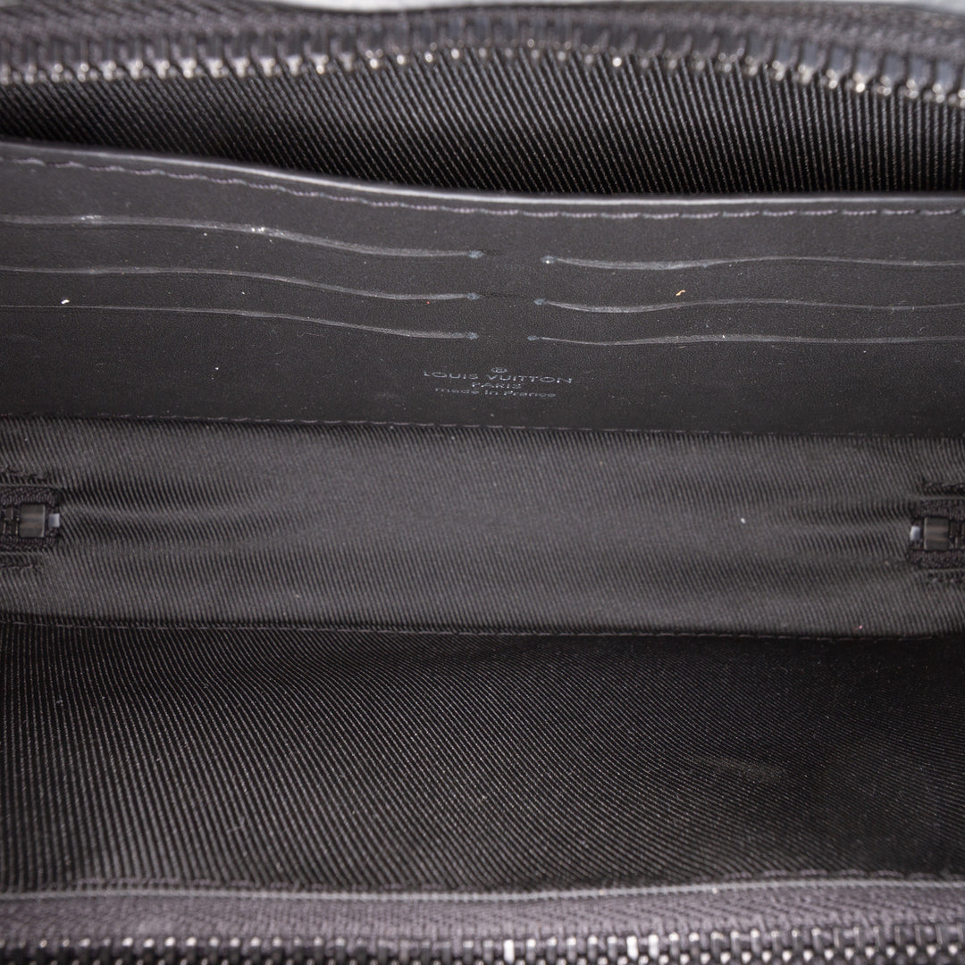 Souple Trunk Portefeuille Monogram Noir