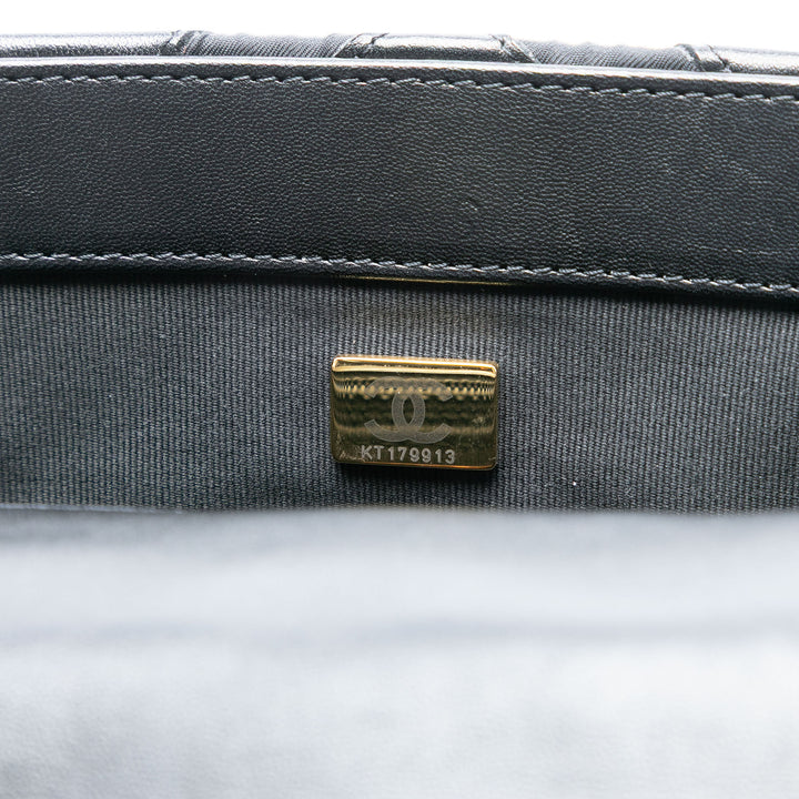 Chanel Medium Cuir d’agneau et Printed Soie Fixation 19 à rabat