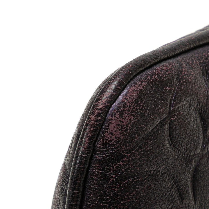 Chanel embossé Camellia Chaîne Pochette Cuir d'agneau
