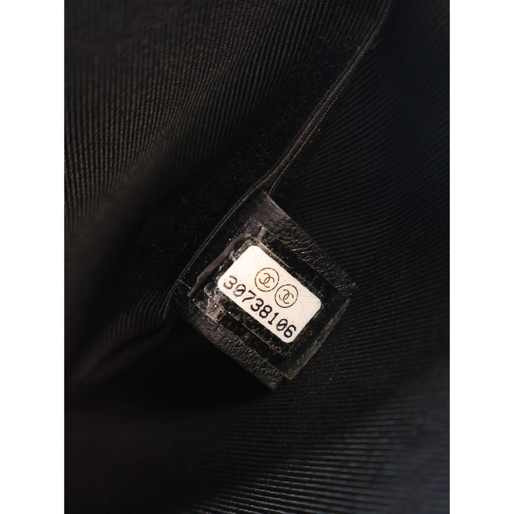 Chanel Pochette CC Matelassé Coco Charms Chaîne Wristlet Cuir d'agneau Noir – vue 7 – GABY PARIS