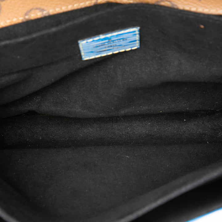Louis Vuitton Reverse Pochette Métis Épi Bleu – vue 4 – GABY PARIS