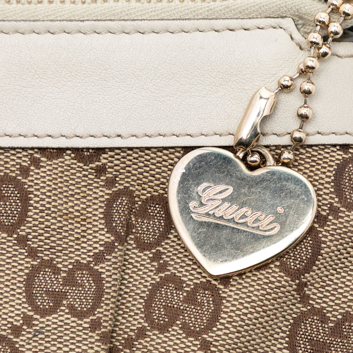 Gucci GG Toile Wristlet Pochette
