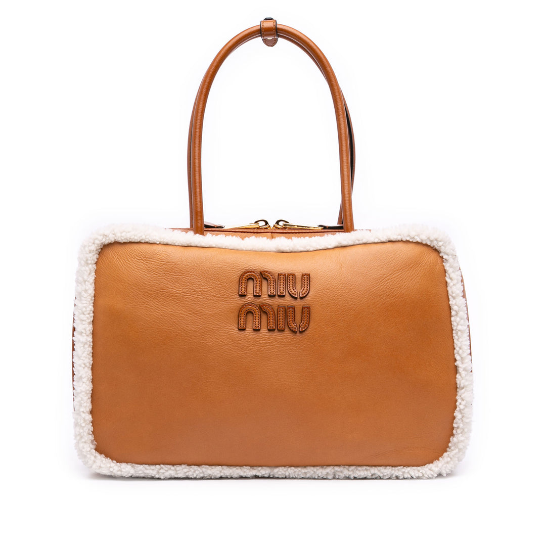 Miu Miu Large Shearling à finitions Cuir de veau Logo Beau Sac bandoulière