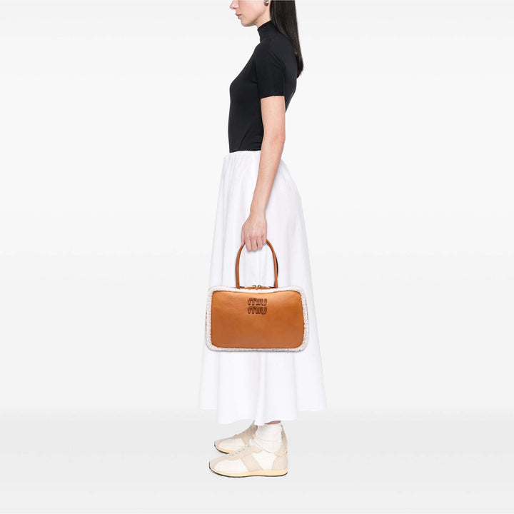 Miu Miu Large Shearling à finitions Cuir de veau Logo Beau Sac bandoulière