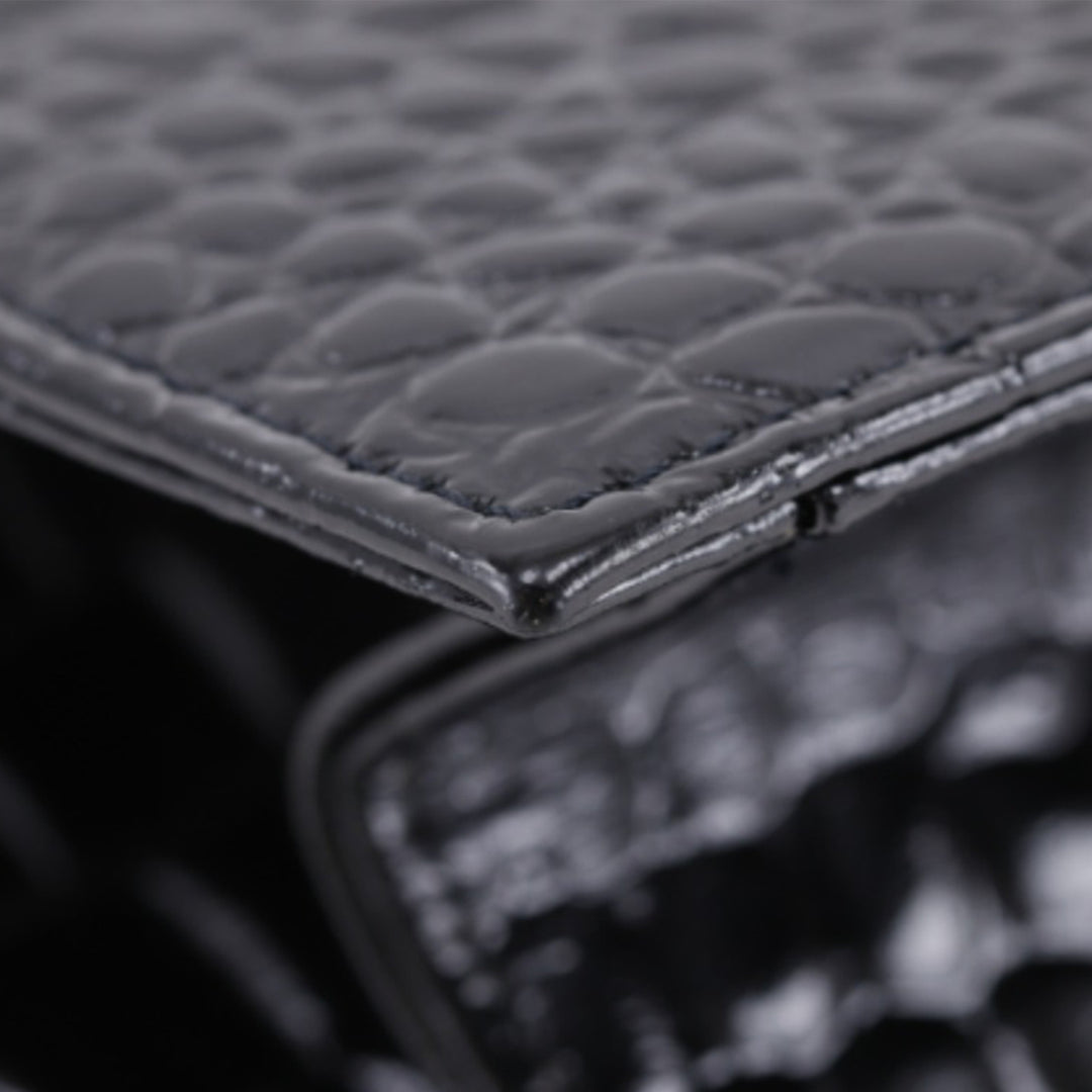 Saint Laurent Croc embossé Cuir verni Pochette