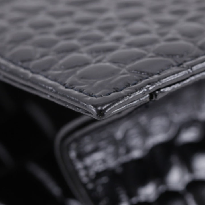 Saint Laurent Croc embossé Cuir verni Pochette