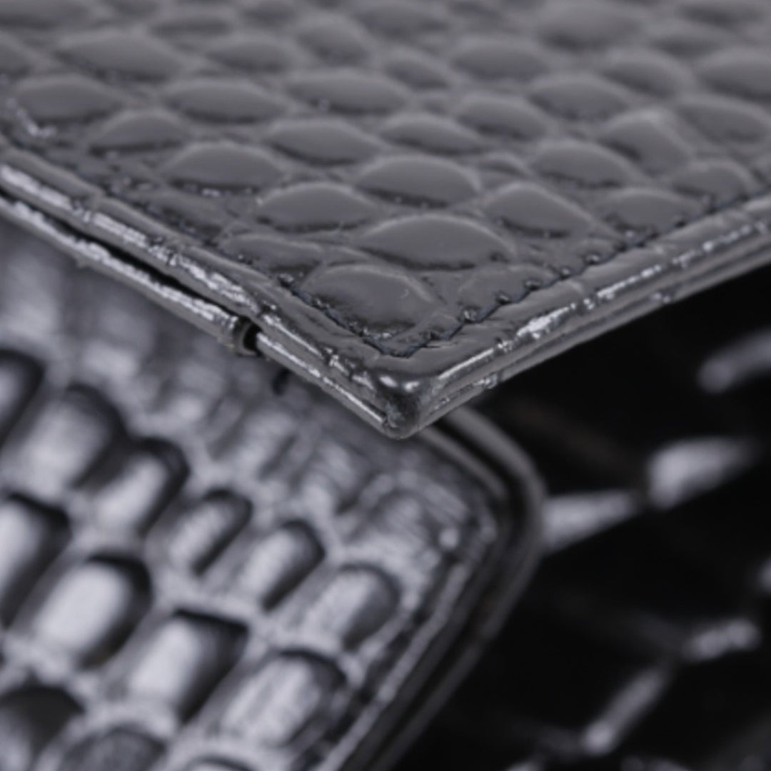 Saint Laurent Croc embossé Cuir verni Pochette