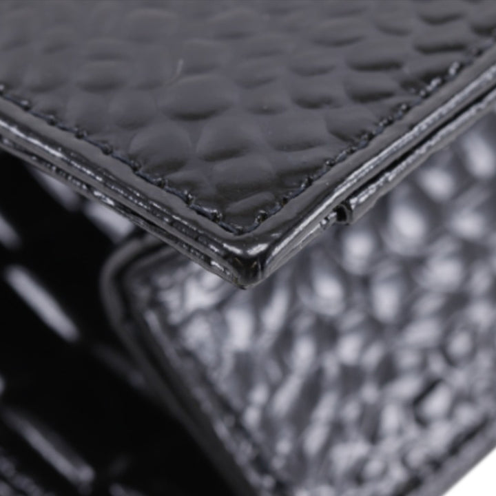 Saint Laurent Croc embossé Cuir verni Pochette