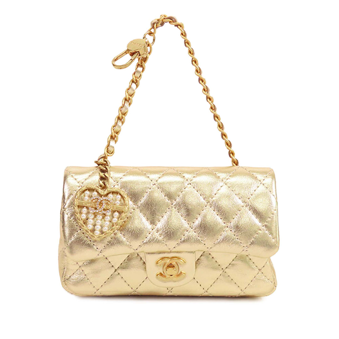 Chanel Mini Classic Métallisé Cuir de veau Charm Double rabat Doré – GABY PARIS Authentique