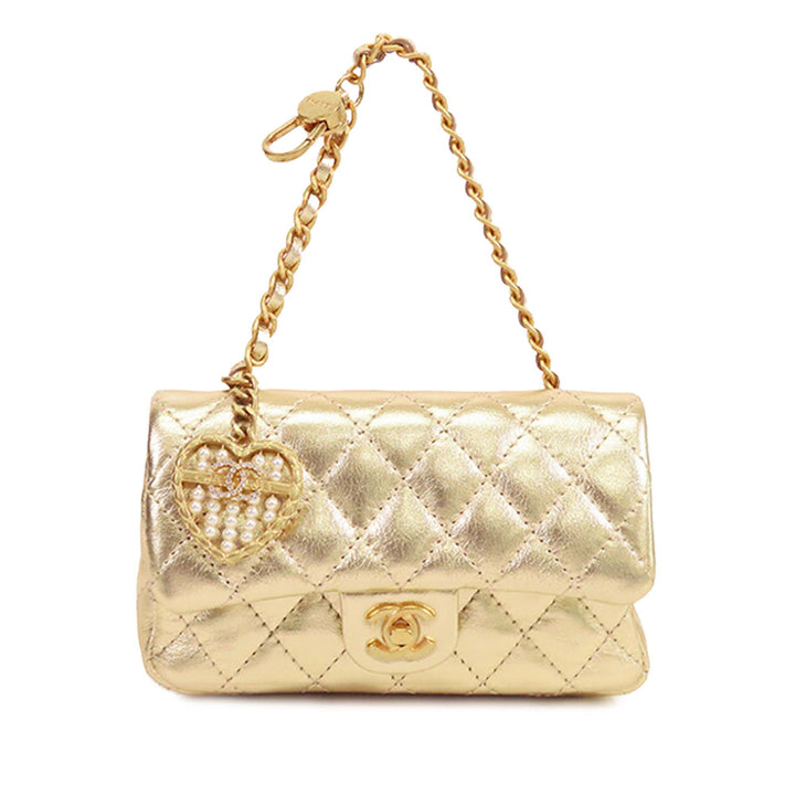 Chanel Mini Classic Métallisé Cuir de veau Charm Double rabat Doré – GABY PARIS Authentique