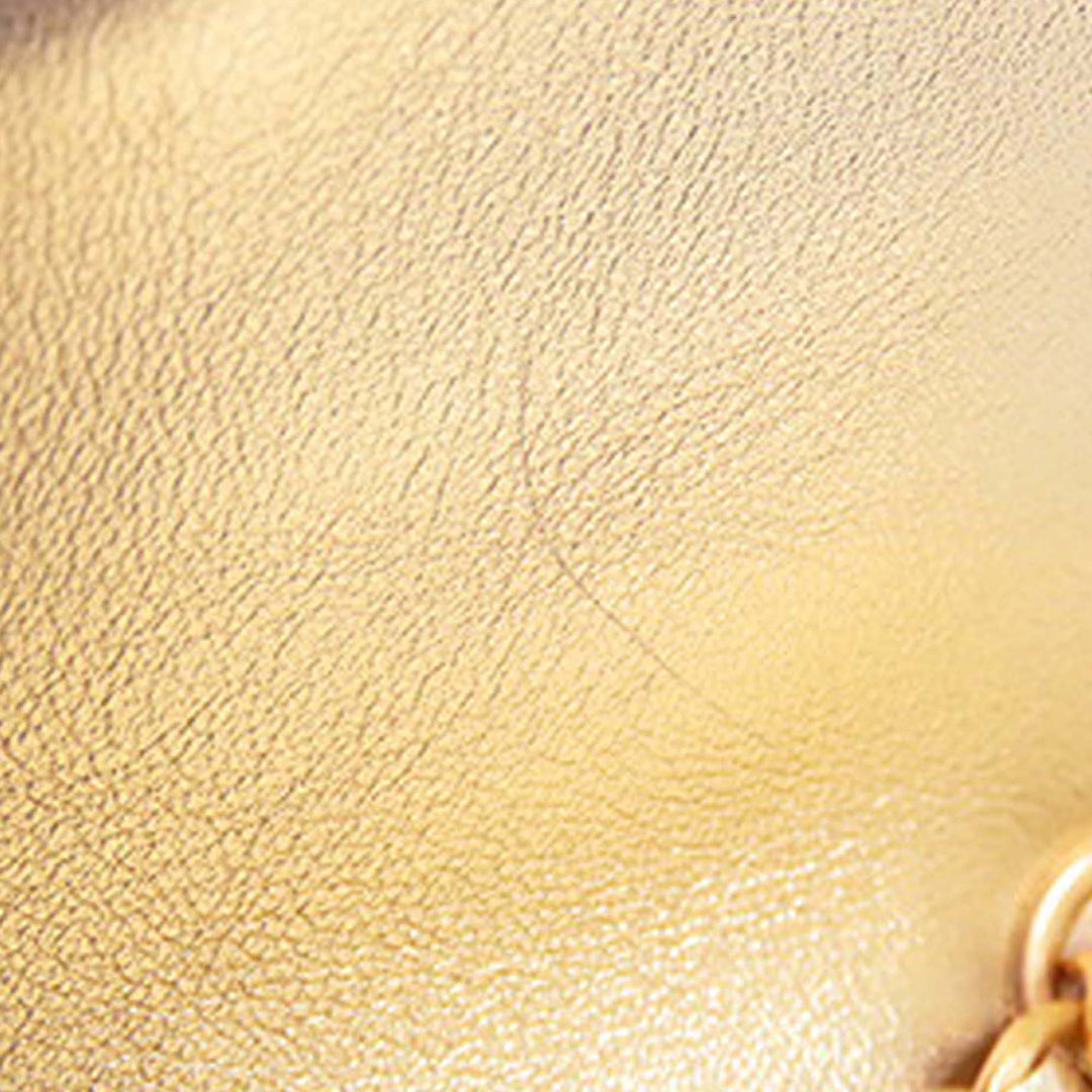 Chanel Mini Classic Métallisé Cuir de veau Charm Double rabat Doré – GABY PARIS Authentique