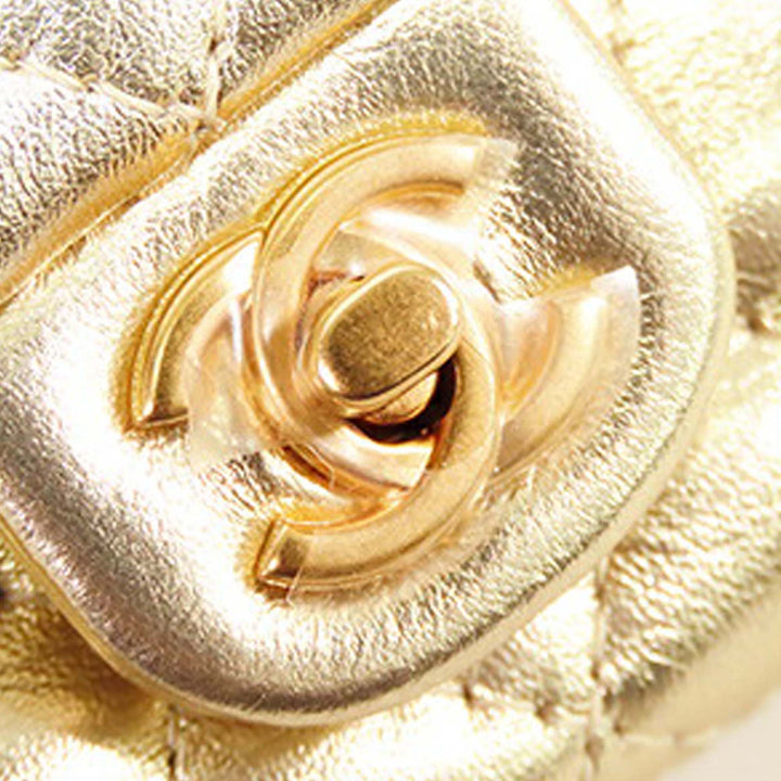Chanel Mini Classic Métallisé Cuir de veau Charm Double rabat Doré – GABY PARIS Authentique