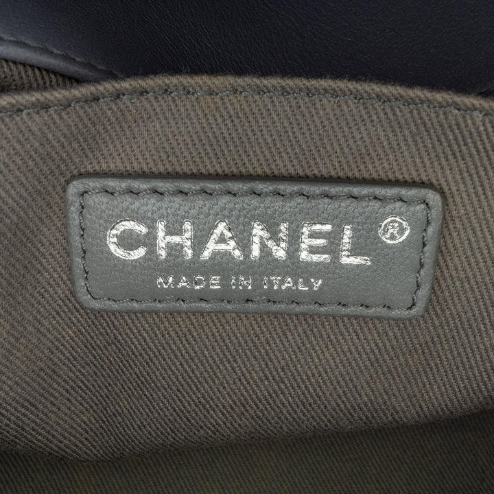 Chanel Medium Lambskin Boy Flap Purple - GABY PARIS