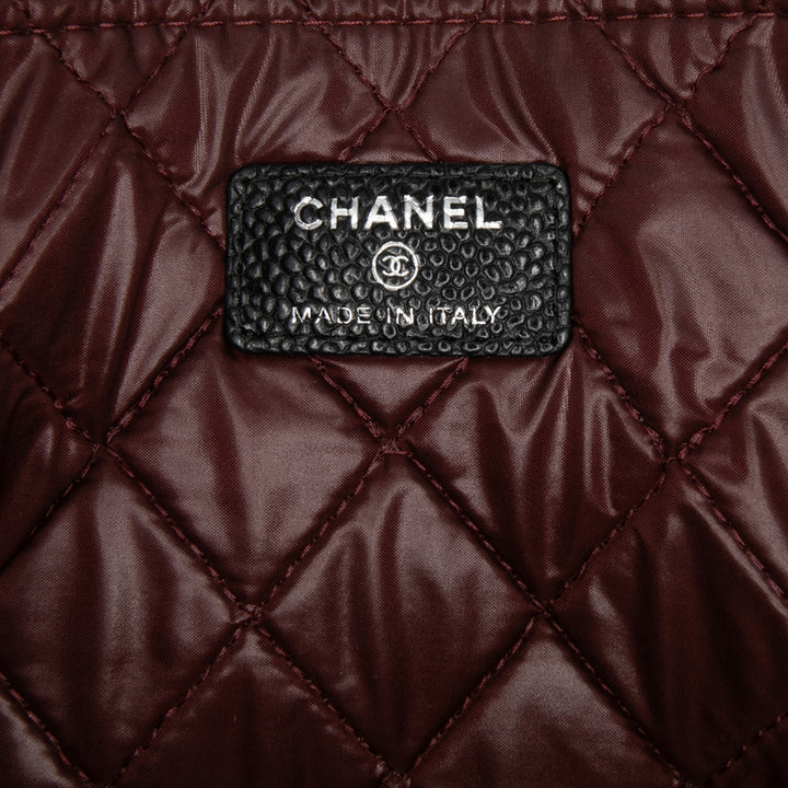 Large Quilted Caviar O Case Clutch Black - Gaby Paris