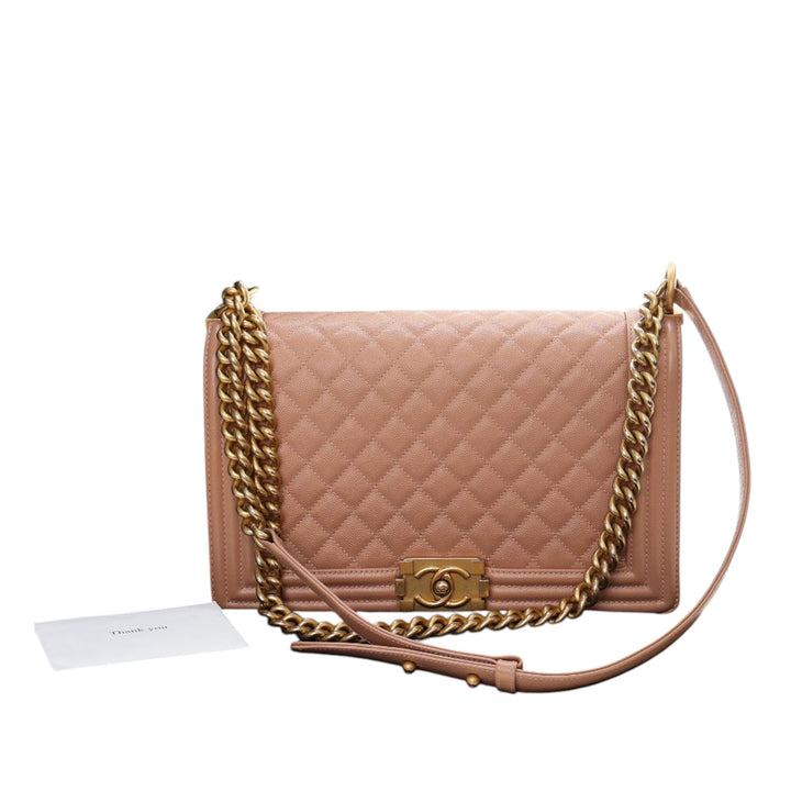 Chanel Medium Matelassé Caviar Boy à rabat