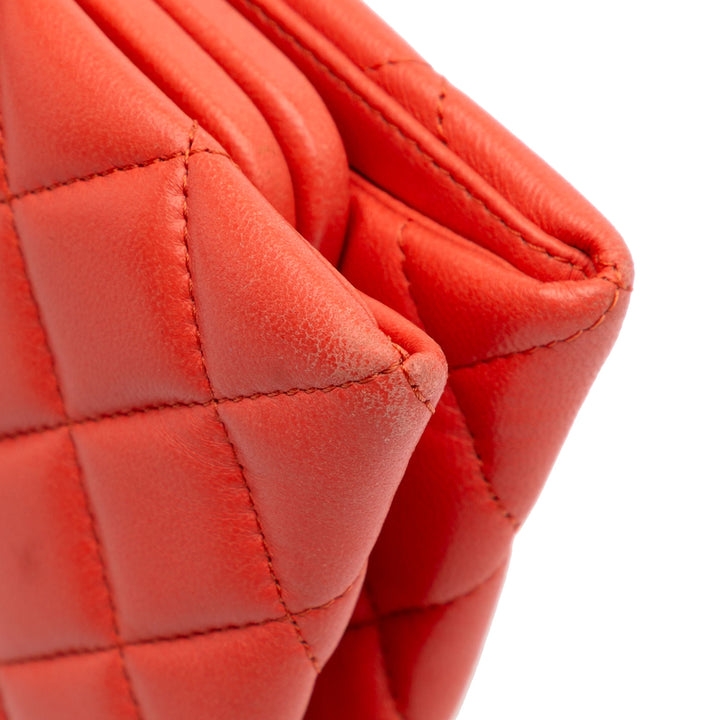 Quilted Lambskin Crystal Camellia Long Clutch Orange - Gaby Paris