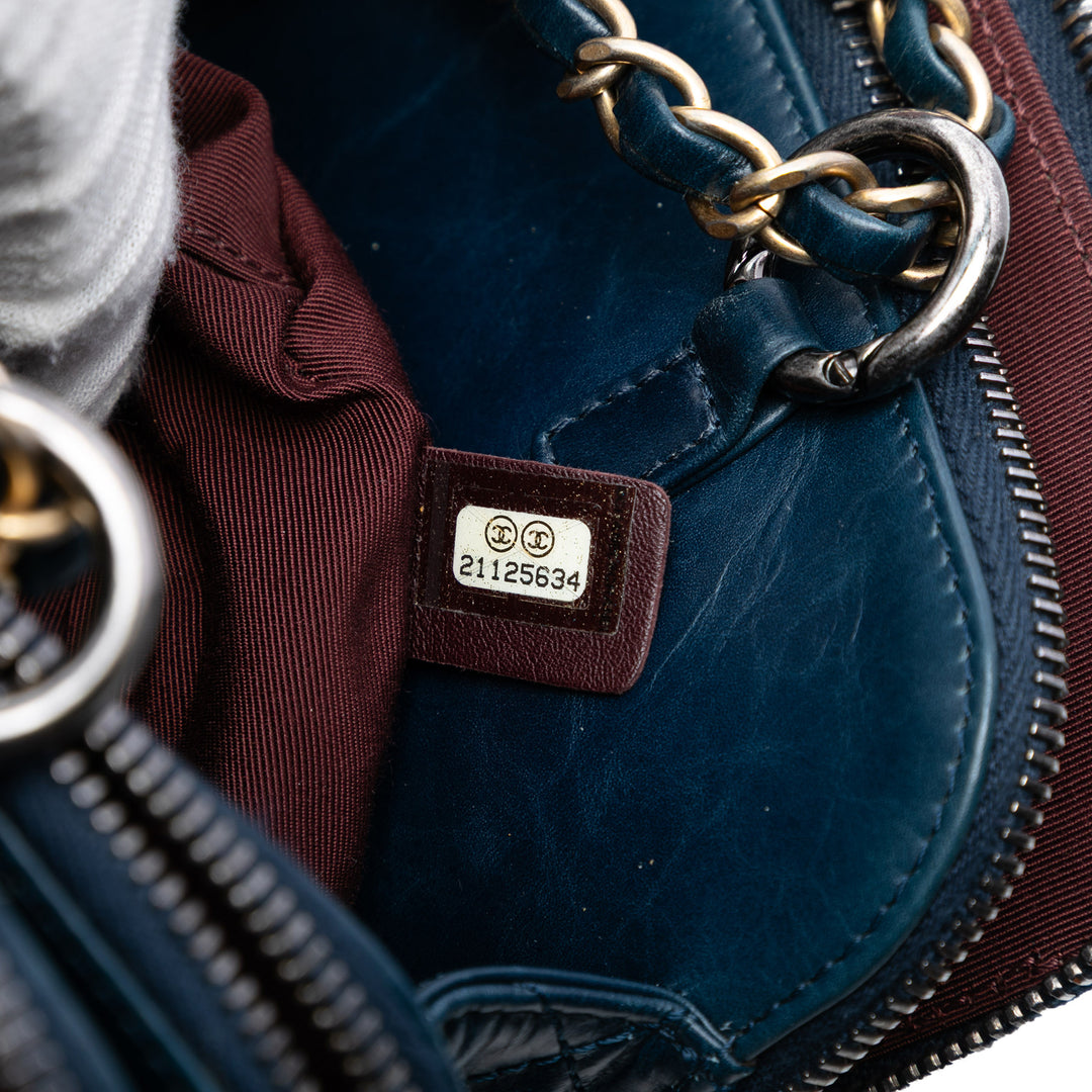 Chanel Medium Matelassé Glazed Cuir de veau Daily Walk Double Zip Sac bandoulière