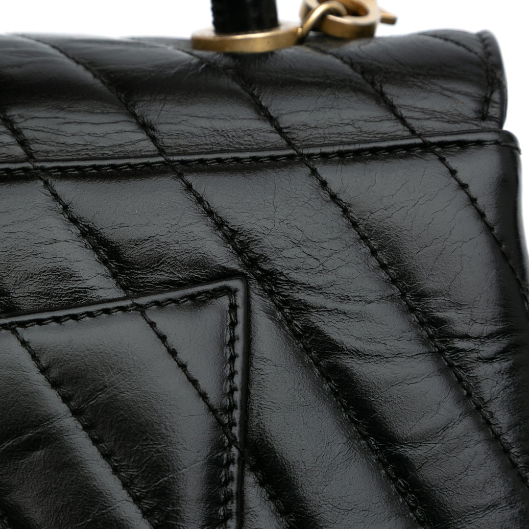 Small Chevron Aged Calfskin Coco Top Handle Bag Black - Gaby Paris