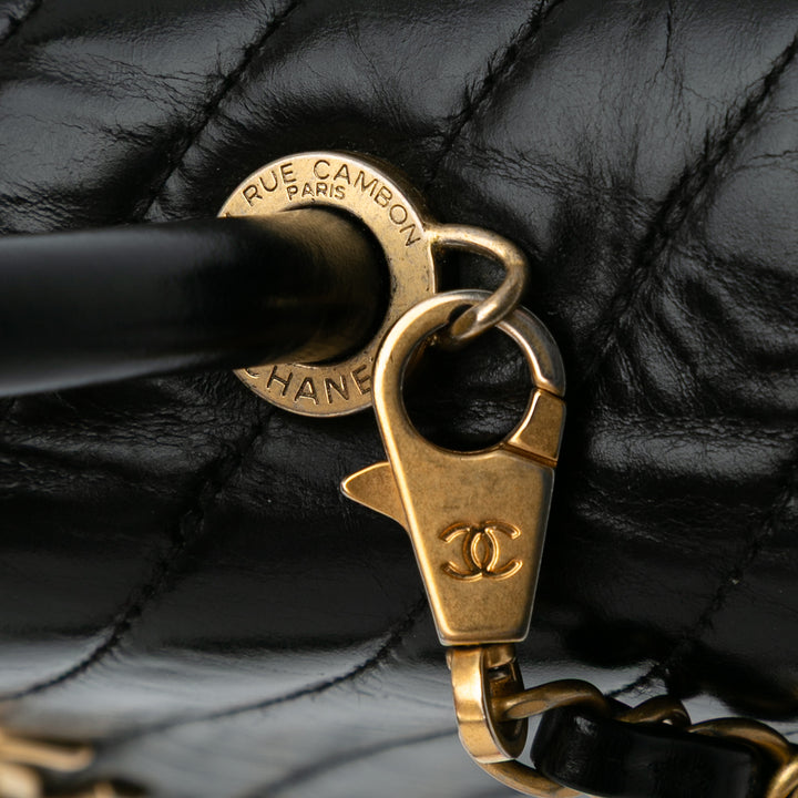 Small Chevron Aged Calfskin Coco Top Handle Bag Black - Gaby Paris
