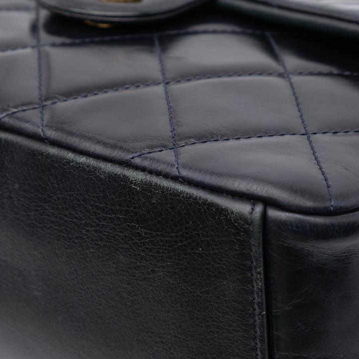 Medium Quilted Glazed Calfskin Gold Bar Top Handle Flap Blue - Gaby Paris