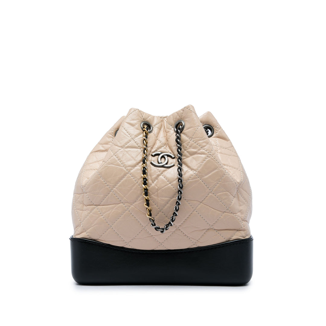 Chanel Sac à dos Bicolore Matelassé vieilli Gabrielle Petit Cuir de veau Noir – vue principale – GABY PARIS