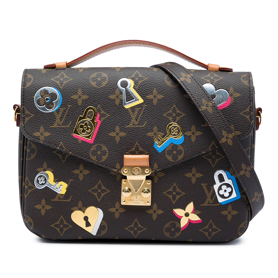 Louis Vuitton Love Lock Pochette Métis Monogram Marron – vue principale – GABY PARIS
