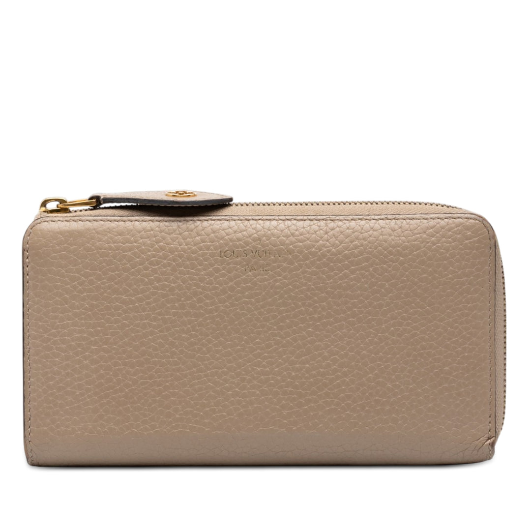 Louis Vuitton Portefeuille Comete Zippy taurillon Beige – vue principale – GABY PARIS