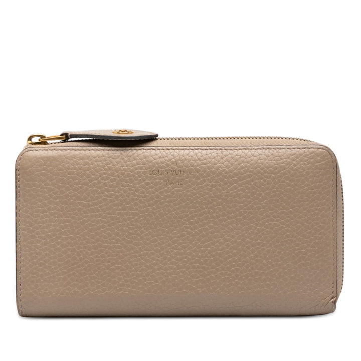 Louis Vuitton Portefeuille Comete Zippy taurillon Beige – vue principale – GABY PARIS