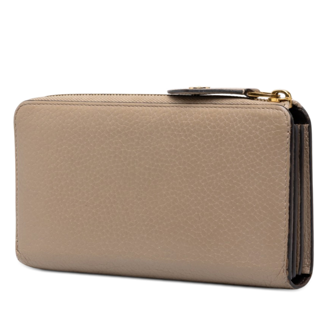 Louis Vuitton Portefeuille Comete Zippy taurillon Beige – vue 2 – GABY PARIS