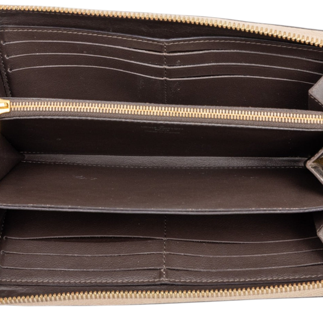 Louis Vuitton Portefeuille Comete Zippy taurillon Beige – vue 4 – GABY PARIS