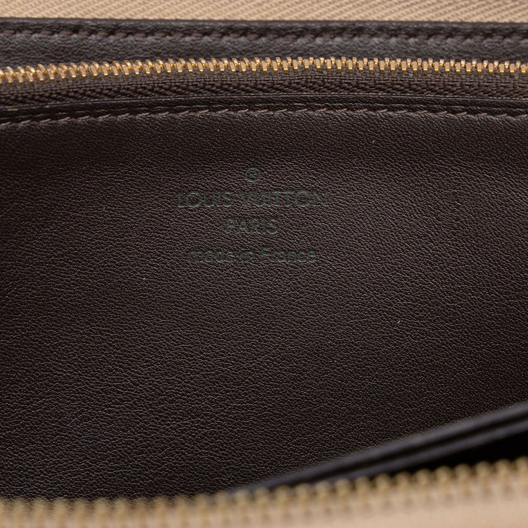 Louis Vuitton Portefeuille Comete Zippy taurillon Beige – vue 5 – GABY PARIS
