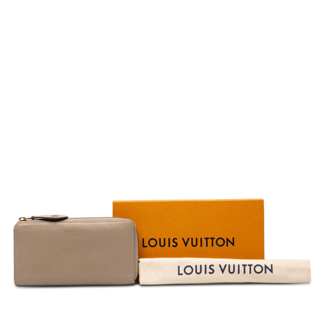 Louis Vuitton Portefeuille Comete Zippy taurillon Beige – vue 7 – GABY PARIS