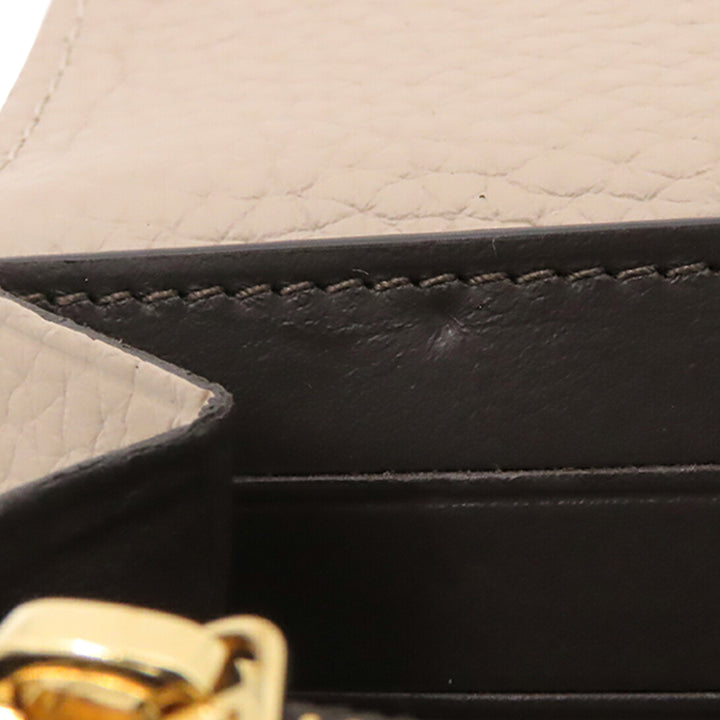Capucines Portefeuille long taurillon Beige
