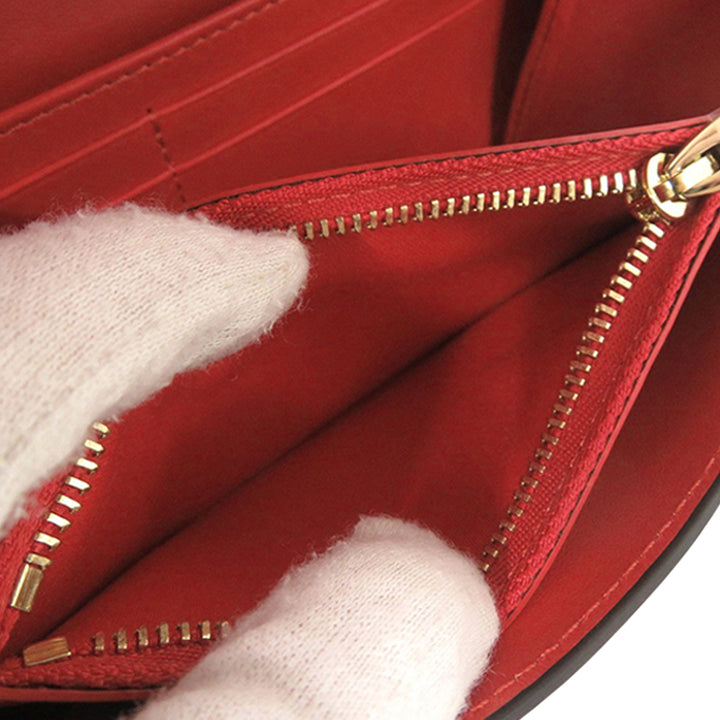 Christian Louboutin Sac bandoulière grainé By My Side Wallet on Chain Cuir de veau grainé Rouge – vue 6 – GABY PARIS