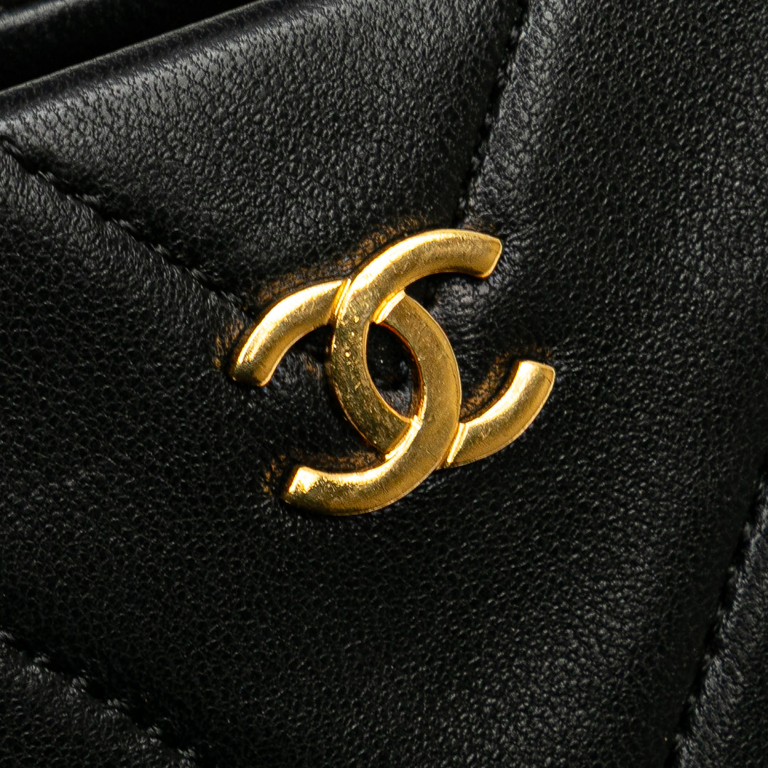 CC Chevron Quilted Lambskin Kiss Lock Shoulder Bag Black - Gaby Paris