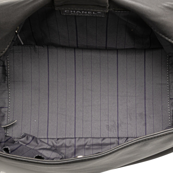 Chanel Cuir d’agneau clouté CC Accordion à rabat