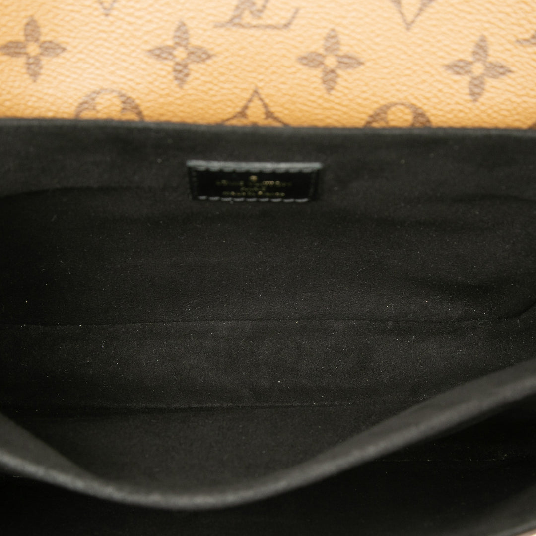Louis Vuitton Pochette Métis Monogram Reverse Marron – vue 4 – GABY PARIS