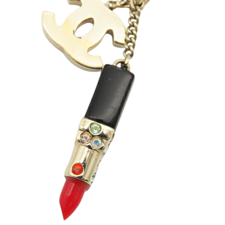 Chanel Doré Plated CC Lipstick Pendant Collier Doré – GABY PARIS Authentique
