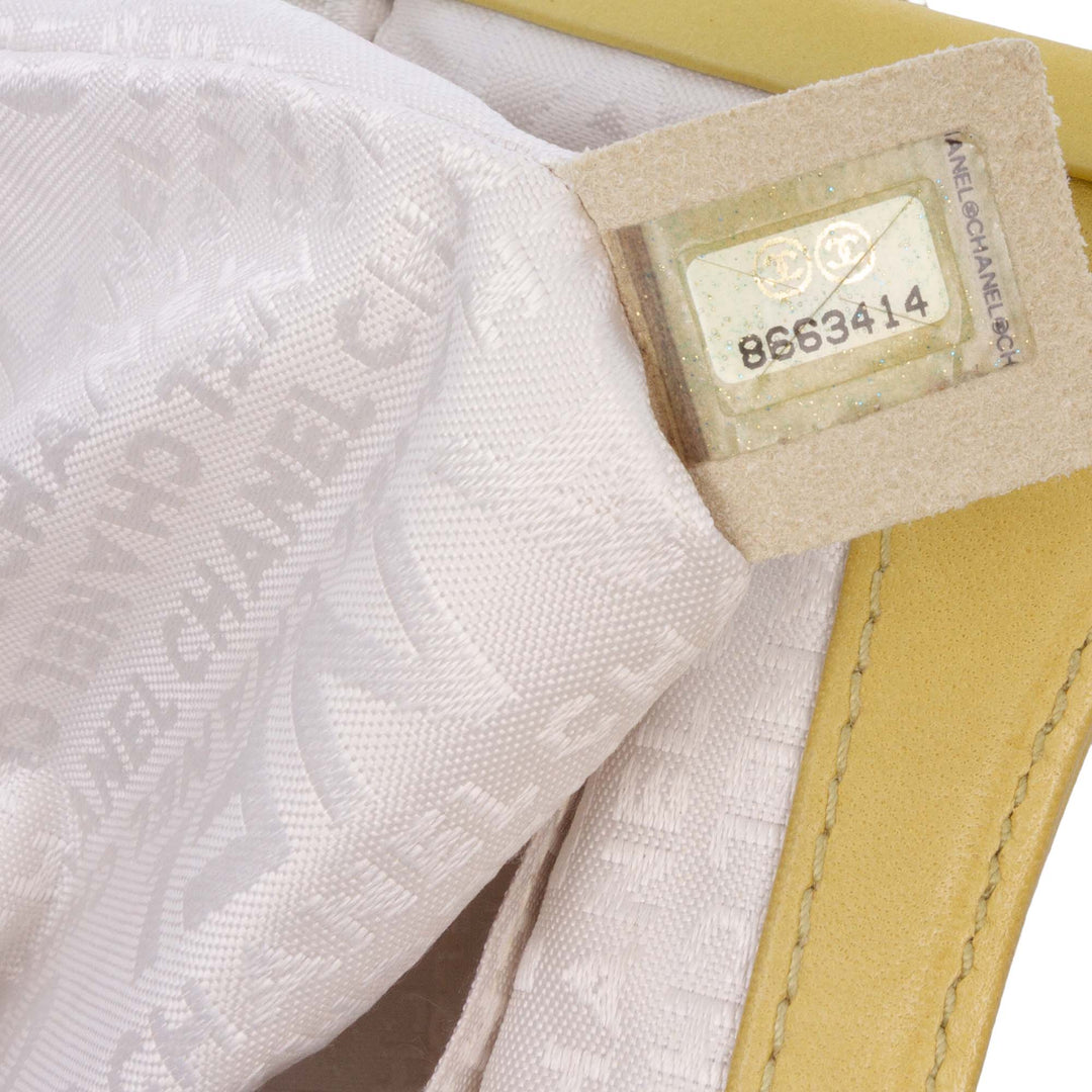 Lambskin Camellia Frame Clutch Yellow - Gaby Paris