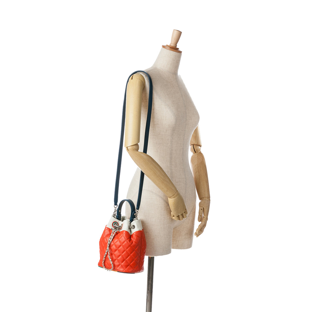 CC Quilted Lambskin Cuba Drawstring Bucket Red - Gaby Paris