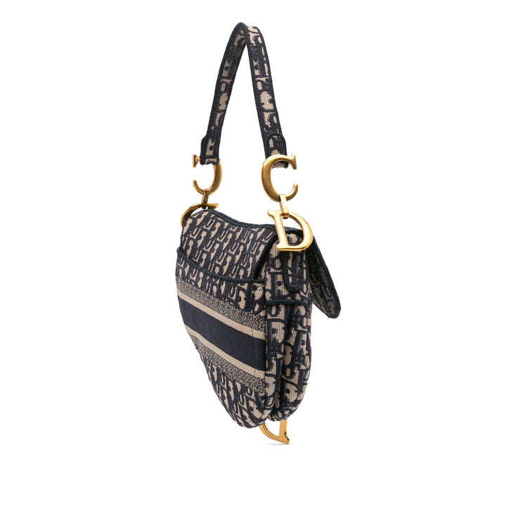 Oblique Embroidered Canvas Saddle Bag Blue - Gaby Paris