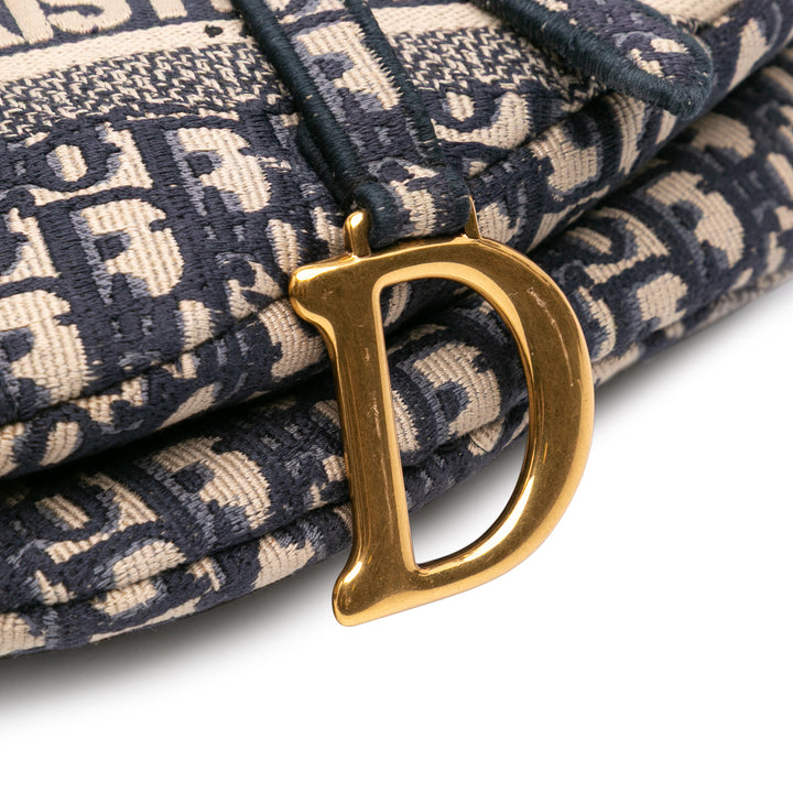 Oblique Embroidered Canvas Saddle Bag Blue - Gaby Paris