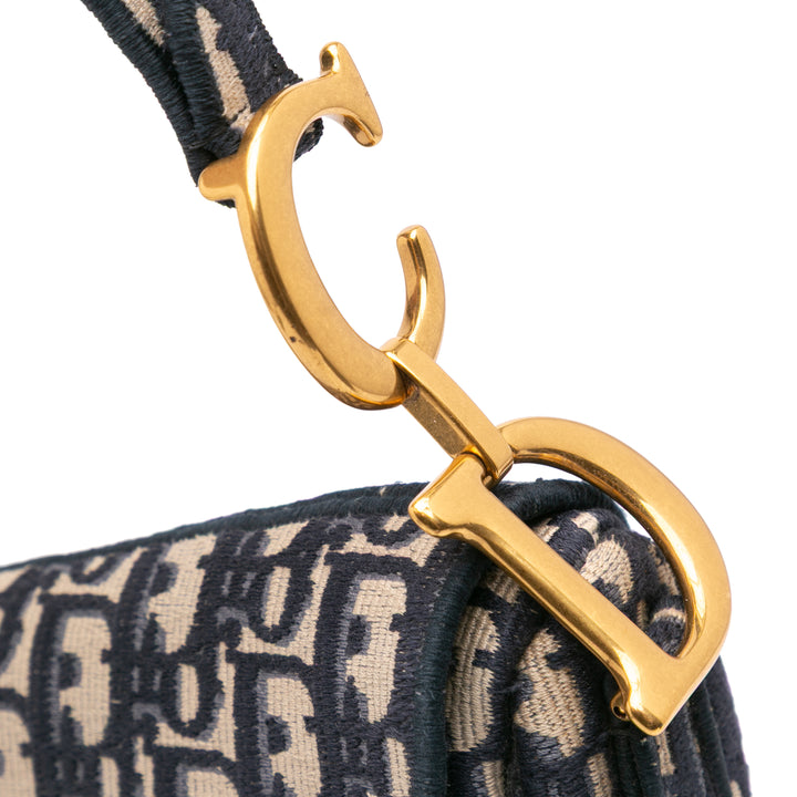 Oblique Embroidered Canvas Saddle Bag Blue - Gaby Paris