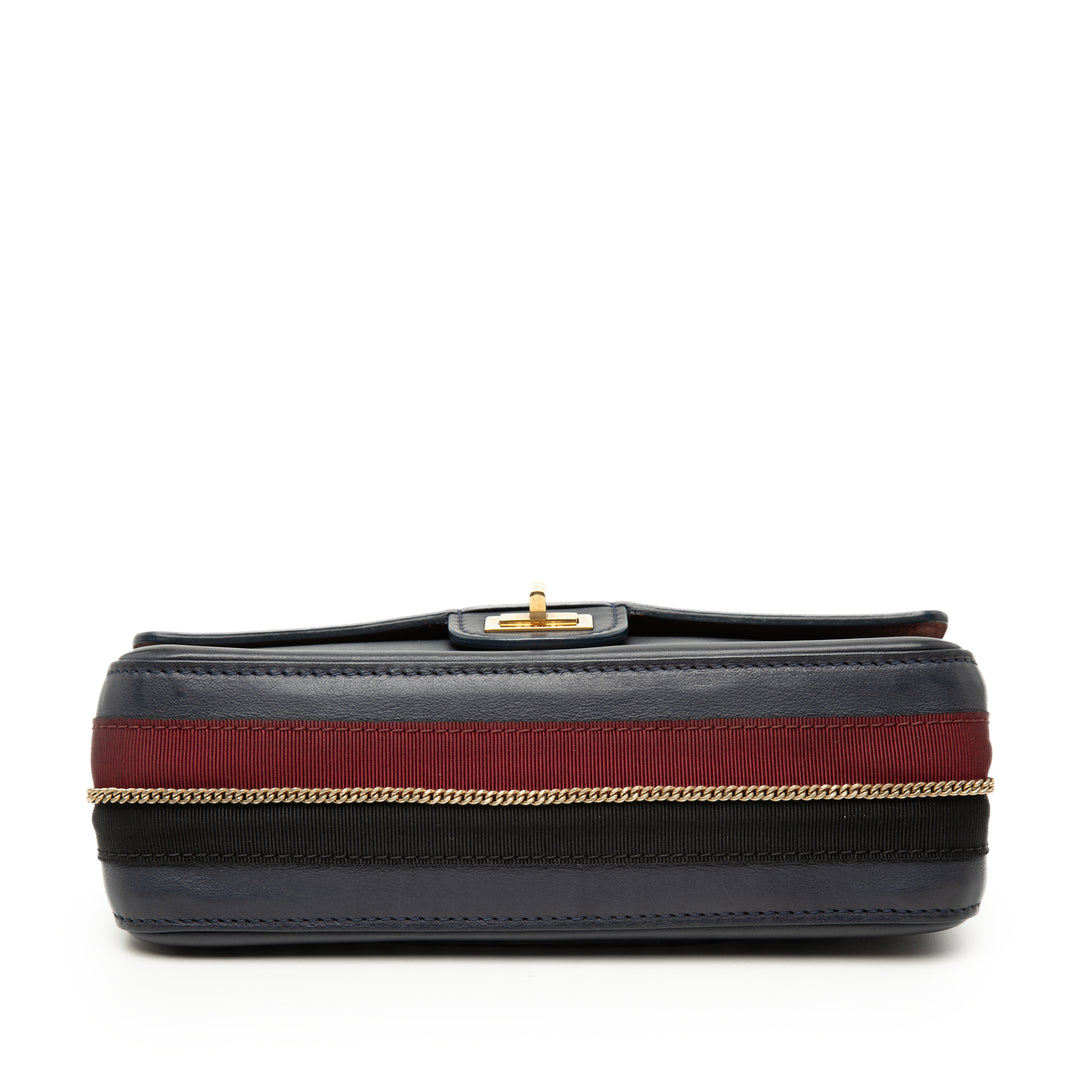 Chanel Cuir de veau Reissue 2.55 Medallion Double rabat 225